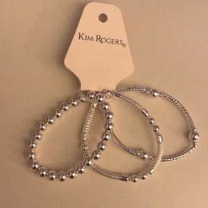 3 silver bracelets that can stretch
